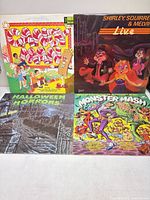 Group shot of all four album covers