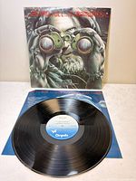 Front sleeve and vinyl record on inner sleeve