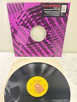 Front of sleeve with title sticker