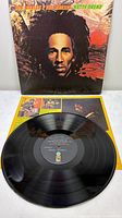 Front album cover featuring Bob Marley portrait