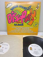 Front cover showing title, graphics, and 2-record note