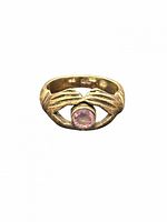 Front view of sterling silver clasped hands ring with pink stone