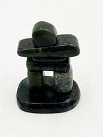 Front view showing full Inukshuk figure and polished surface