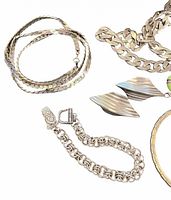 Flat herringbone necklace, round-link bracelet, curb chain, earrings detail