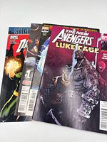 Three overlapping Marvel comic books