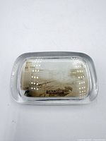 Top view of rectangular glass paperweight with sepia Public Square photograph