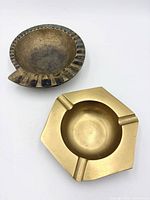 Top view of both bronze ashtrays