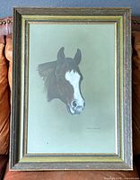 Frontal view of framed horse portrait showing artwork, frame and signature