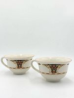 Both porcelain teacups front view
