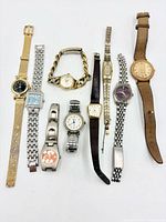 All nine watches laid out side by side