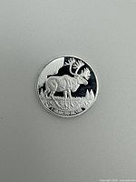 Obverse showing elk design