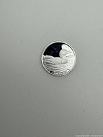 Obverse showing loon design