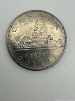 Reverse of 1972 Canadian dollar showing Voyageur canoe design