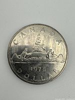 Voyageur canoe reverse of 1978 dollar coin