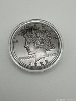 Obverse view of copper round showing Liberty head, date 1922