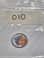 Reverse side showing colourized design and year