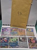 All eight sleeved cards with envelope