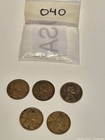 All five Lincoln Wheat cents with plastic bag marked 040