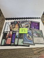 Group of overlapping Magic: The Gathering cards on tabletop