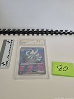 Front view of NXR-slabbed Annihilape ex card with Gem Mint 9.5 label