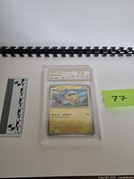 Front view of graded Captain Pikachu card showing grade and card face