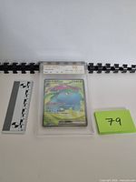 Front view of NXR-slabbed Venusaur ex card with GEM MINT 10 label