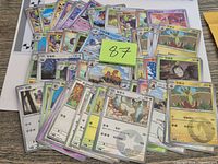 Top view of entire stack of Simplified Chinese Pokémon cards spread out