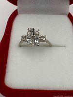Ring in presentation box showing overall design and stones