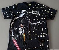Front view showing Darth Vader graphic, lightsaber, and logo