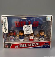Front of sealed box showing four figures and Buffalo Bills branding