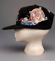 Left side profile of black Florida Panthers hat showing side patch and brim