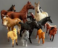 Front view of all 14 horse figurines