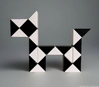 Puzzle configured as dog shape showing alternating colors