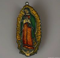 Front view of Virgin Mary sun catcher showing colors and design