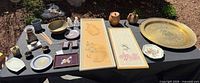 overall lot view showing brass tray, prints, ceramics