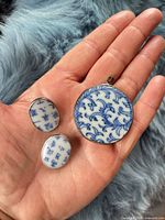 front view pendant and earrings showing porcelain pattern