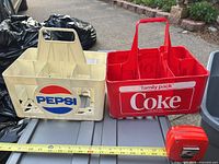 Front view of both carriers showing logos and color
