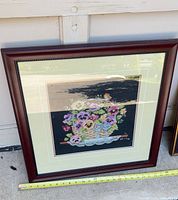 Front view of framed cross stitch showing entire artwork and frame