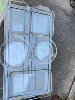 All five glass baking dishes laid out for size comparison