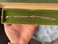 Full view of multi-strand sterling bracelet on box lid