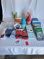 Full lot overview of all disposable tableware items on table