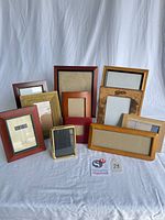 Group shot showing all eleven assorted frames standing on surface