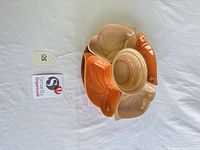 top view of five ceramic pieces assembled