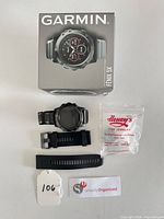 Overall lot showing watch, extra straps, Henry’s bag, and box