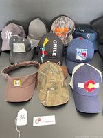 All twelve headwear items grouped together