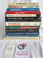 Stack of all 13 books showing spines