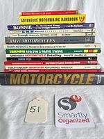 Stack showing book spines for twelve titles