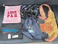 Group shot of five assorted bags