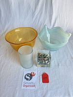 Group shot of both bowls, votive holder and cube vase with stones
