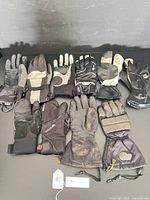 Group shot of all six glove pairs laid out